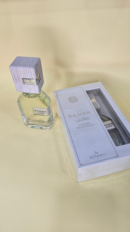 ادکلن ارض الزعفران مدل صاحب اینتنس سفید رایحه لویی ویتون ایمجینیشن