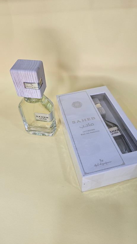 ادکلن ارض الزعفران مدل صاحب اینتنس سفید رایحه لویی ویتون ایمجینیشن