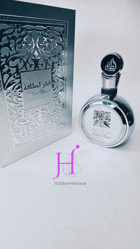 ادکلن لطافه مدل فخر پلاتین مشابه رایحه ایو سن لورن وای الکسیر