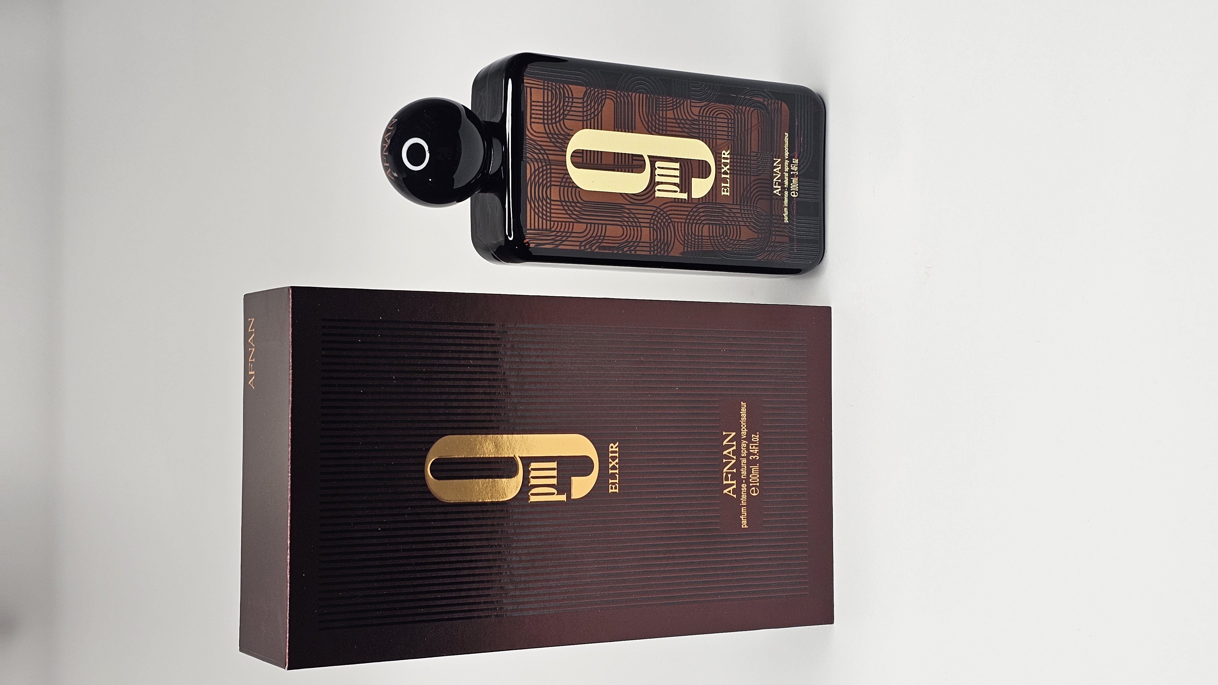 عطر ادکلن افنان مدل 9 پی ام الکسیر رایحه ژان پل گوتیه له میل الکسیر ابسولو